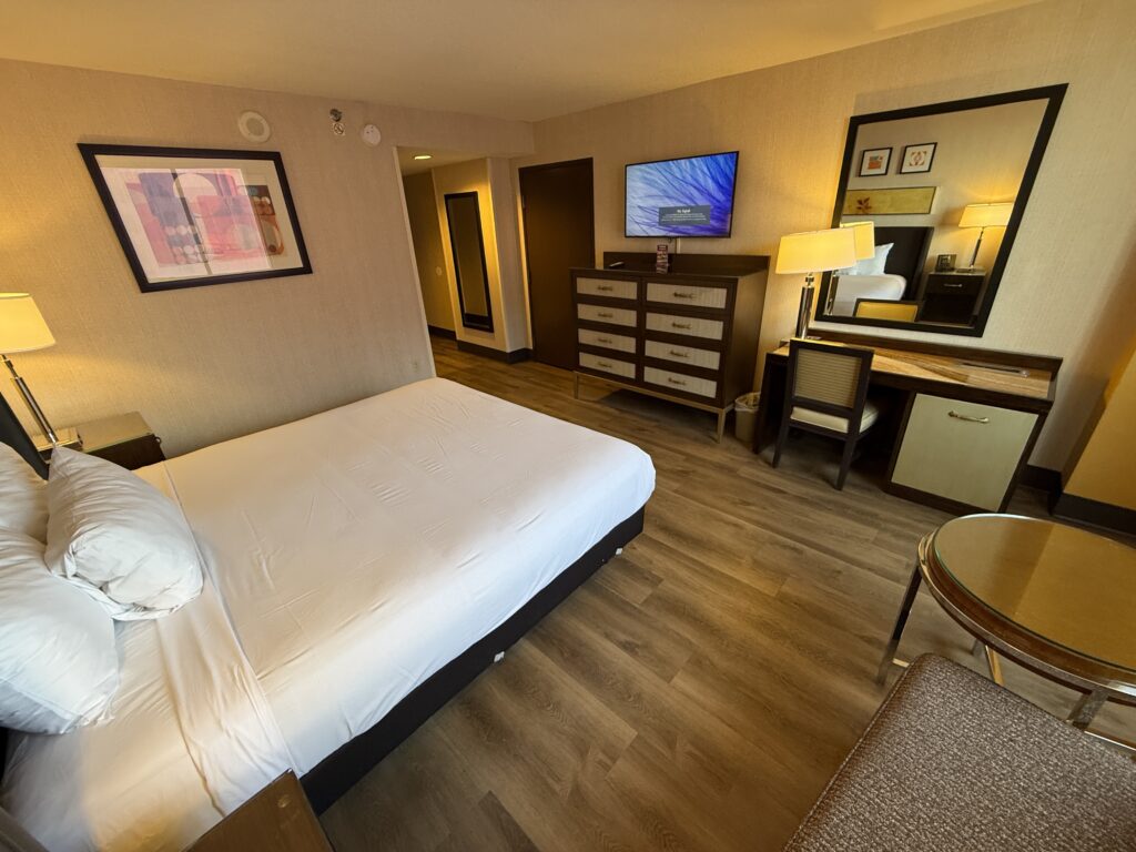 Another Angle of the room, which shows the king bed pointed at a TV.