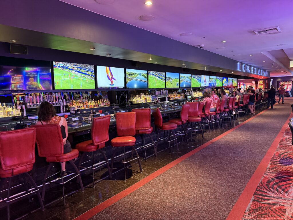 Longbar, with a ton of TVs hanging on the back wall.