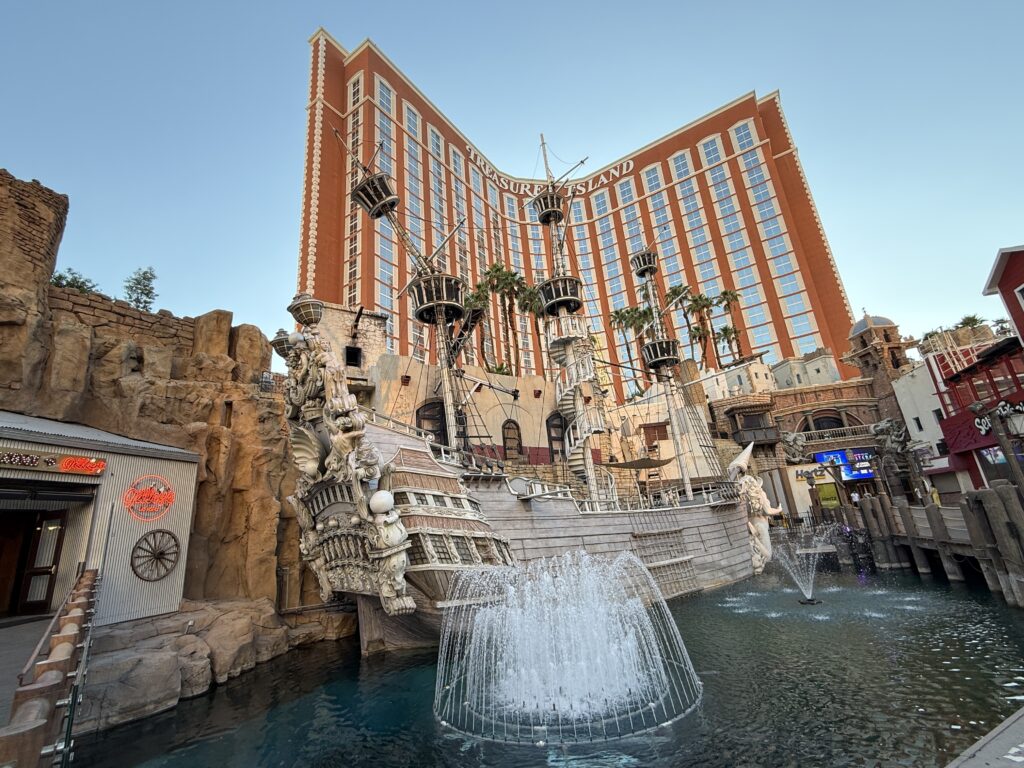 Exterior of TI Las Vegas, with the water feature and ship in the foreground in front of the Tower.