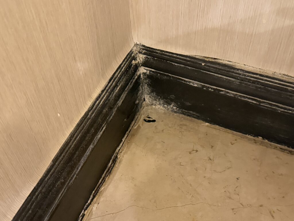 A suffed up baseboard corner.