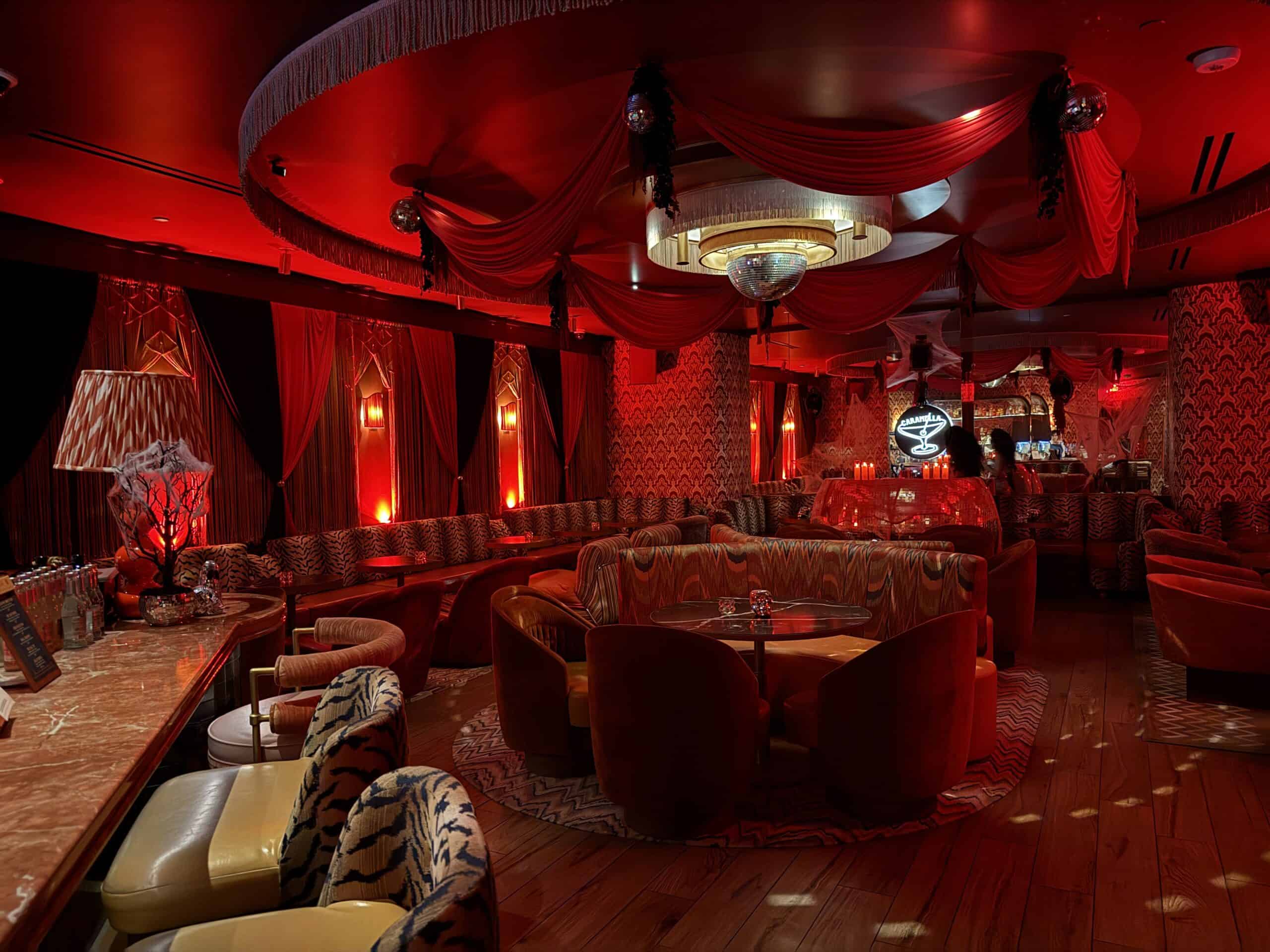 The lounge, which has red lighting and accents.