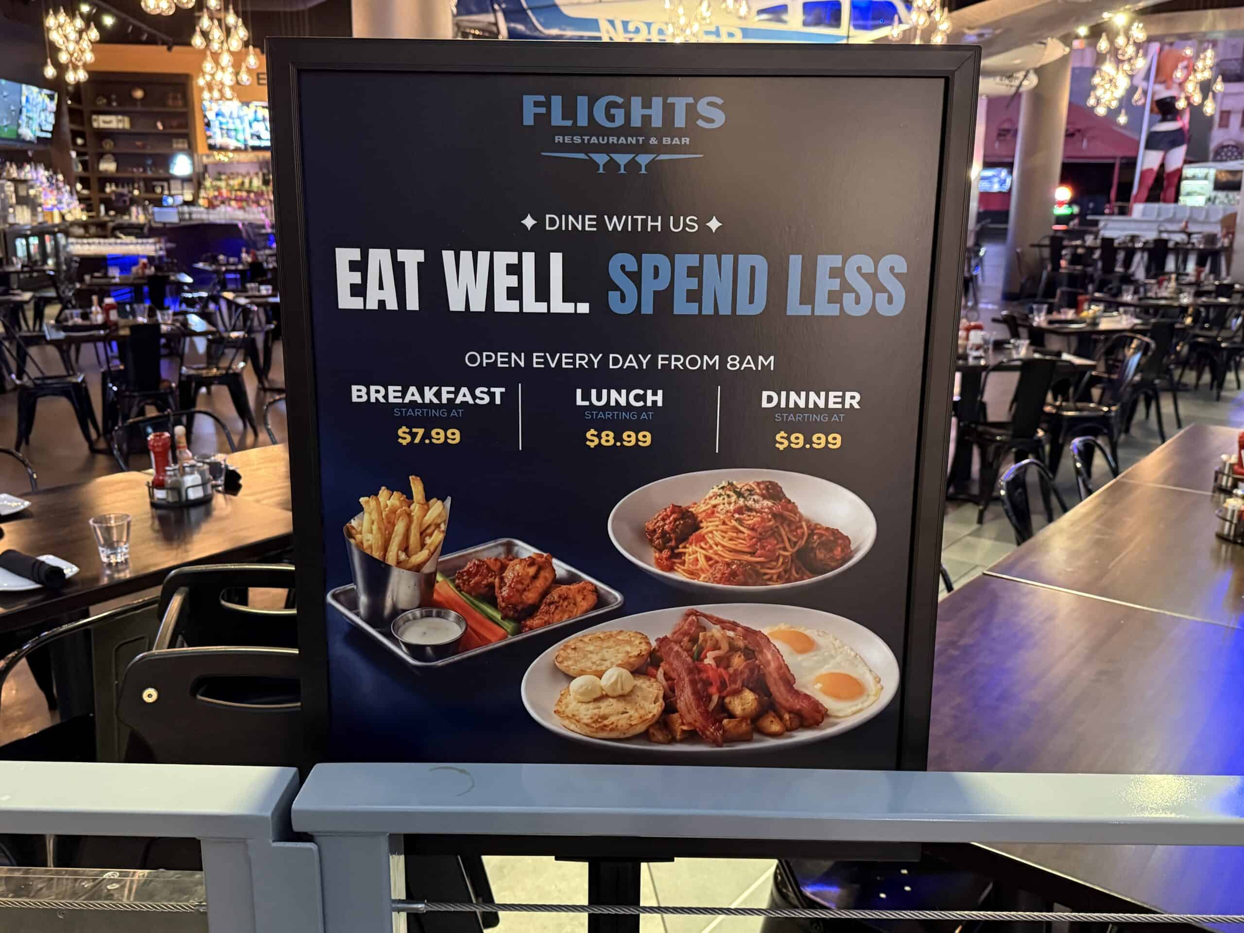 A sign adversising food deals at Flights.