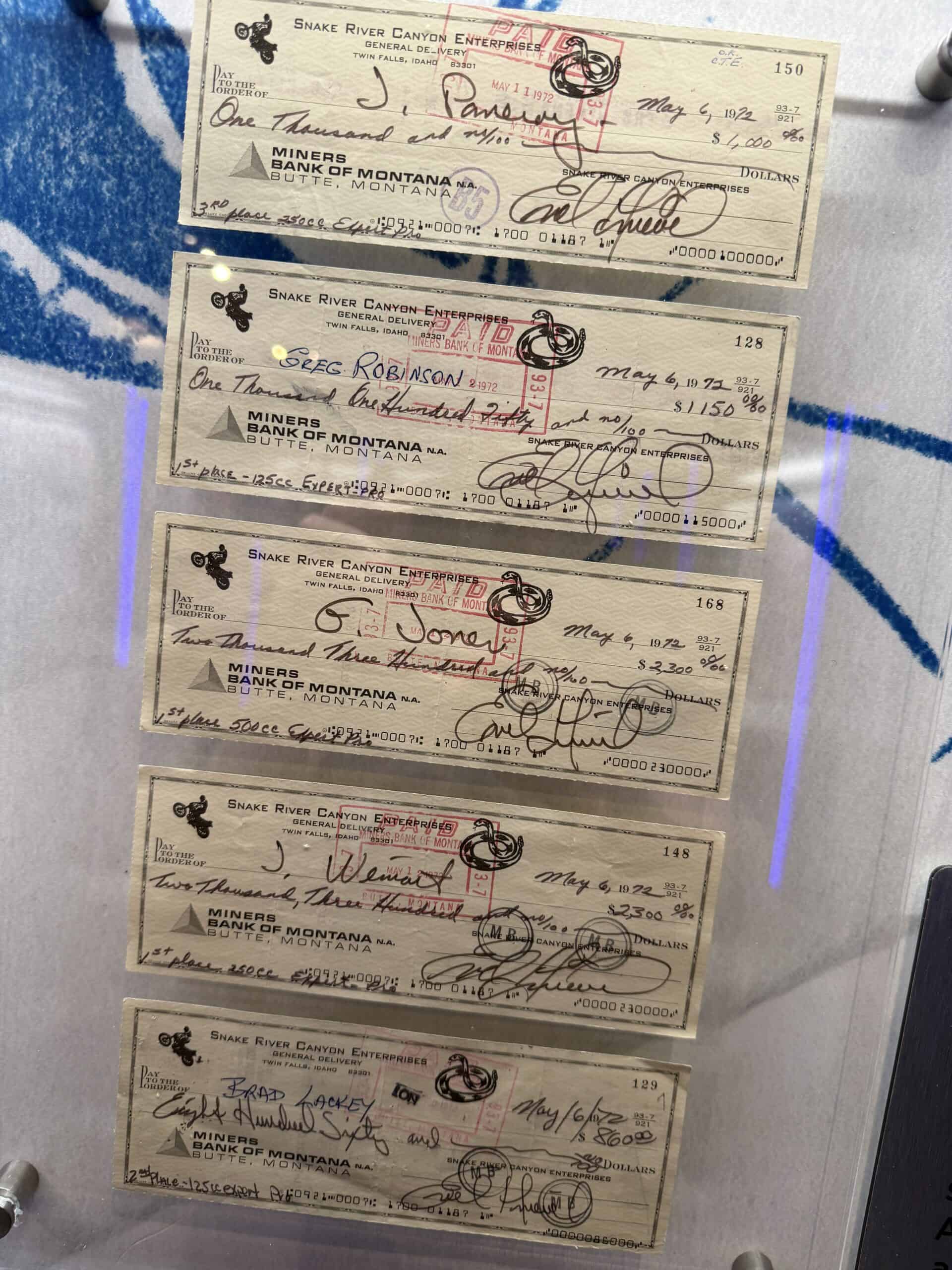 Signed checks from Evel.