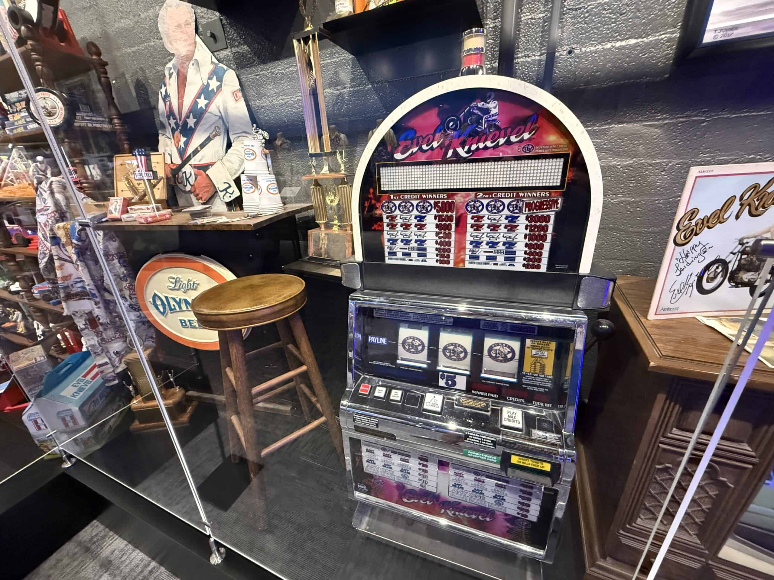 An Evel themed slot machines and other pop culure items.