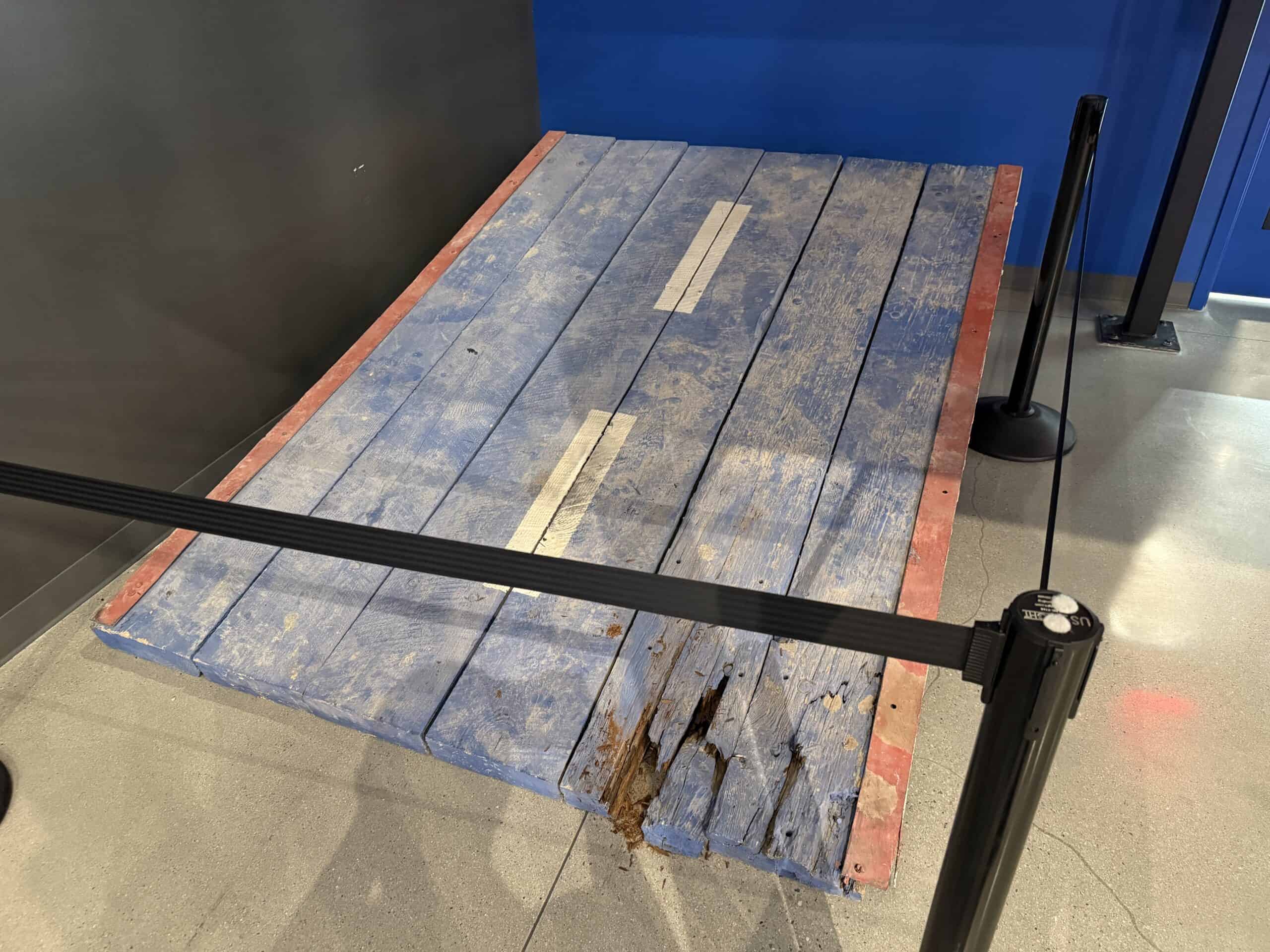 A red, white, and blue jump ramp.