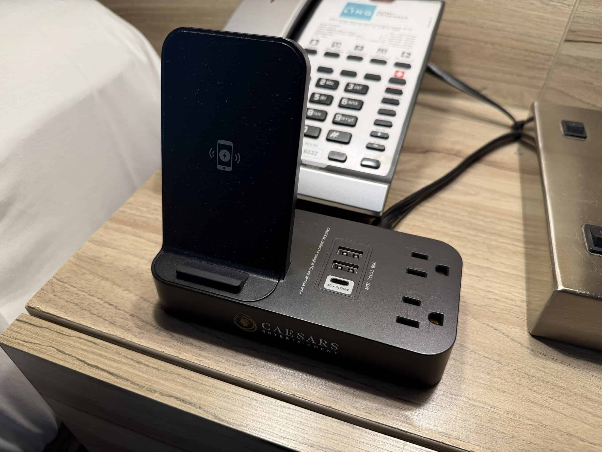 A bedside charging bank with wireless, outlets, and USB options.