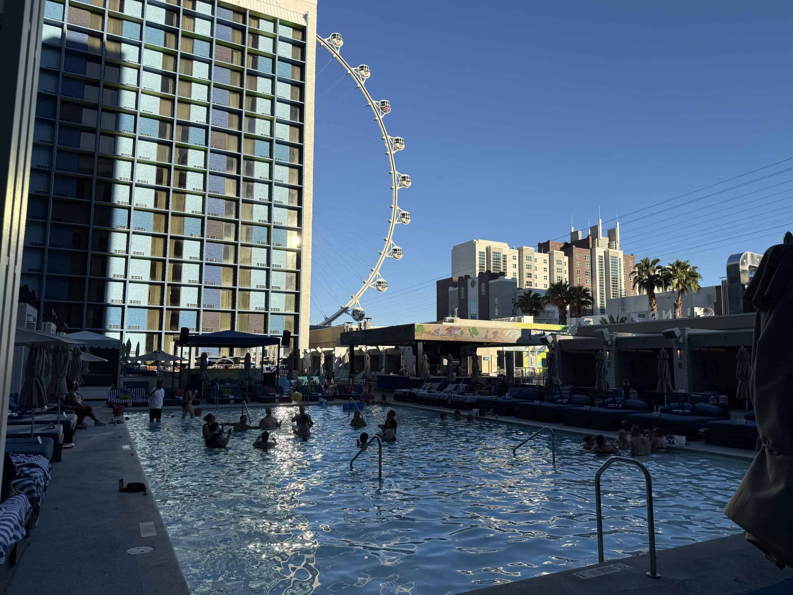 LINQ's pool, with the hotel tower and part of the HIgh Roller in the background.