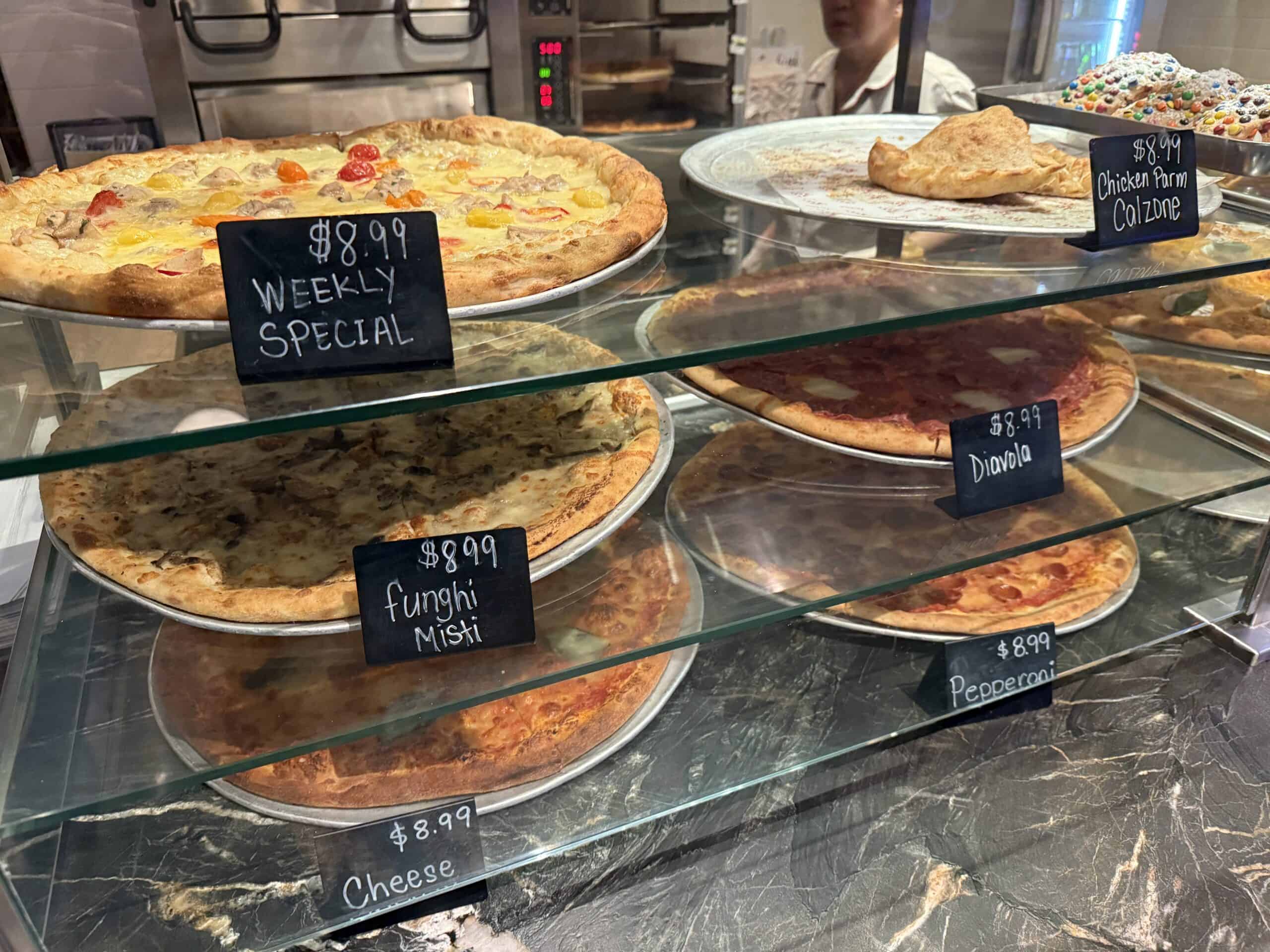 A close up of the pizzas available to purchase at Luchini.