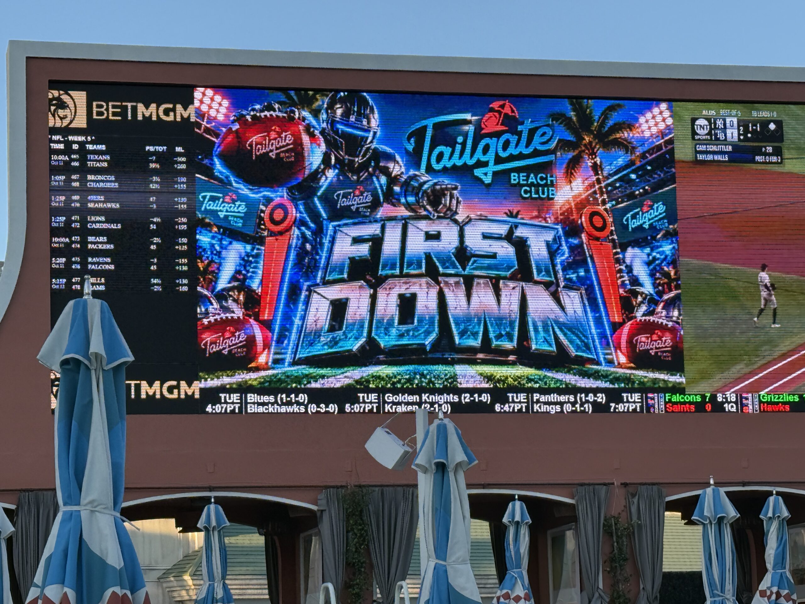 A custom Tailgate Beach Club First Down graphic.